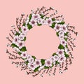 A lush wreath of pink cherry flowers and bright green cherry leaves along with young willow branches.ÃÂ½ÃÂµÃâÃÂ° Royalty Free Stock Photo